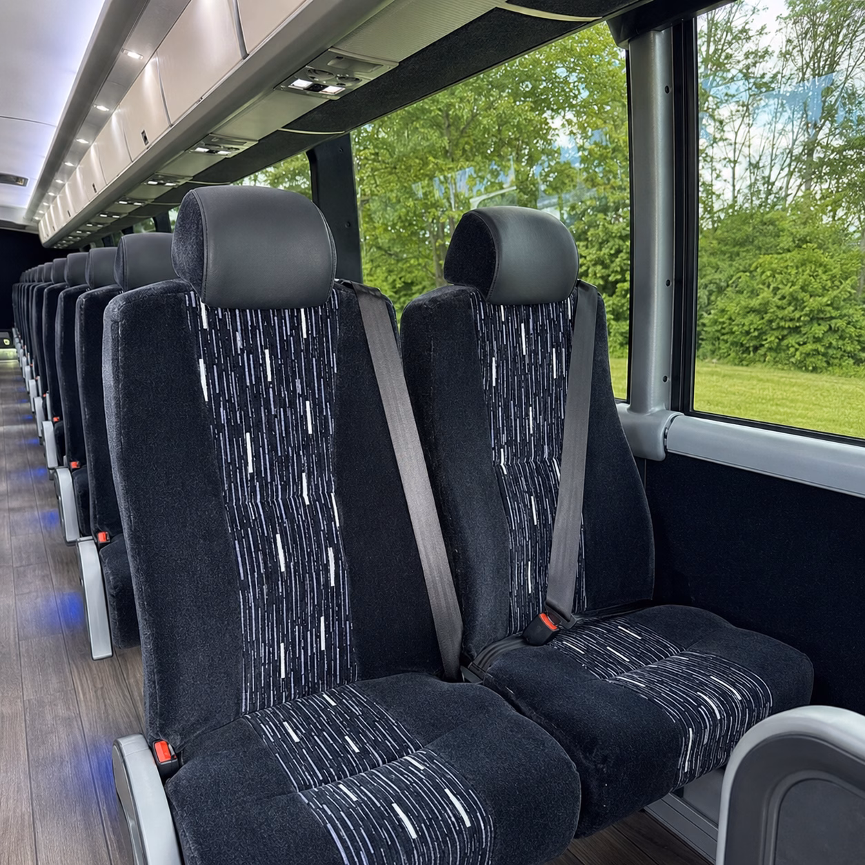 how seasonality and peak times affect charter bus rental rates in sterling heights michigan